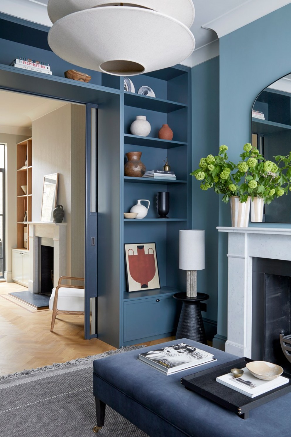Between the Commons, SW11 | Bespoke joinery and pocket doors (blue) | Interior Designers
